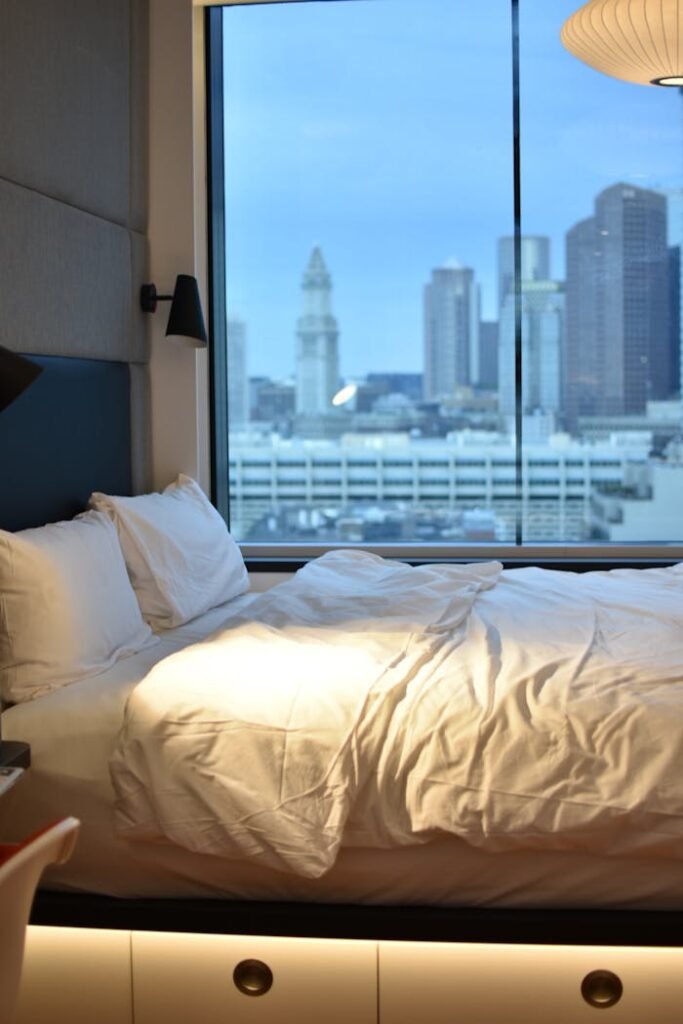 pexels-photo-2873951 White Pillows on Bed Beside Window